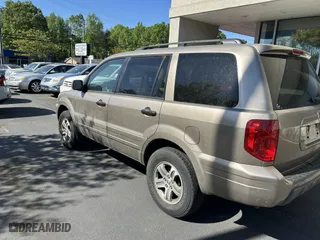 2004 Honda Pilot EX with VIN 2HKYF18574H592240, listed as a IAAI auction lot 42062516 with 182,108 mi miles. Bid and sale history available at carsss.com. Image 3.