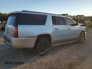 2015 GMC Yukon XL SLE z VIN 1GKS1GKC7FR285469, wystawiony jako Copart lot #81177424 z przebiegiem Nie podano mil oraz Czysty tytuł • Clean title. Historia ofert i sprzedaży dostępna na DreamBid. Obrazek 3.