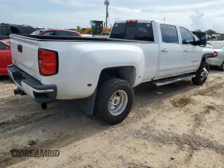 2016 GMC Sierra 3500HD Denali z VIN 1GT42YE84GF304755, wystawiony jako Copart lot #64882644 z przebiegiem 120 309 mil mil oraz Szkody całkowita. Historia ofert i sprzedaży dostępna na DreamBid. Obrazek 3.