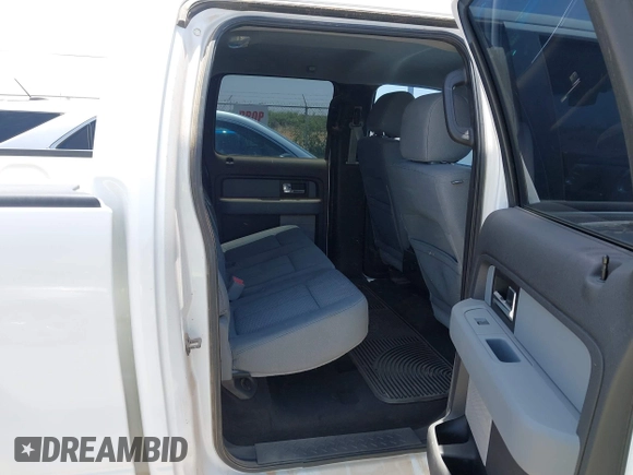 2013 Ford F-150 XL z VIN 1FTFW1EF7DKF06463, wystawiony jako IAAI lot #42256802 z przebiegiem 139 537 mil mil oraz . Historia ofert i sprzedaży dostępna na DreamBid. Obrazek 8.