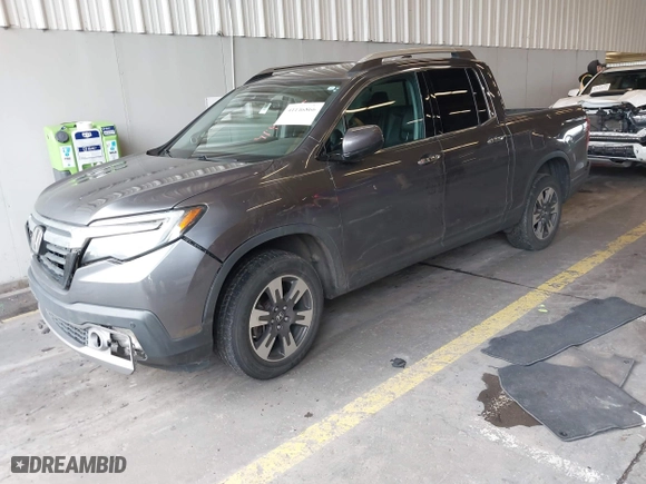 2017 Honda Ridgeline RTL-E with VIN 5FPYK3F73HB034764, listed as a IAAI auction lot 41146866 with 125,885 mi miles. Bid and sale history available at carsss.com. Image 17.