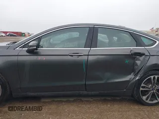 2020 Ford Fusion Titanium with VIN 3FA6P0K97LR192657, listed as a IAAI auction lot 42170258 with 87,696 mi miles and . Bid and sale history available at DreamBid. Image 15.