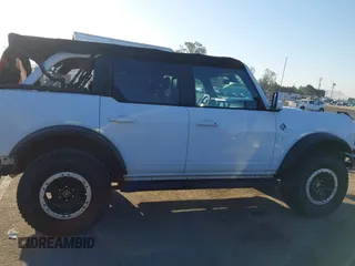 2021 Ford Bronco z VIN 1FMEE5DP7MLA93692, wystawiony jako IAAI lot #42222219 z przebiegiem 18 982 mil mil oraz . Historia ofert i sprzedaży dostępna na DreamBid. Obrazek 14.
