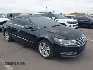 2013 Volkswagen CC Sport with VIN WVWBP7AN6DE504679, listed as a IAAI auction lot 42034362 with 148,527 mi miles. Bid and sale history available at carsss.com. Image 1.