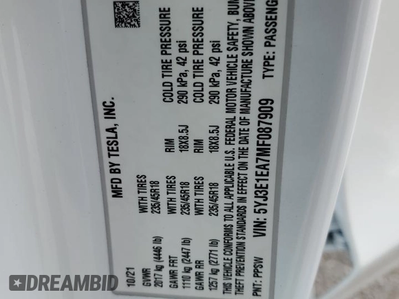 2021 Tesla Model 3 Standard Range Plus with VIN 5YJ3E1EA7MF087909, listed as a Copart auction lot 50942395 with 16,591 mi miles and Salvage Title. Bid and sale history available at carsss.com. Image 14.