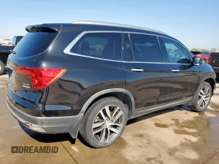 2017 Honda Pilot Elite with VIN 5FNYF6H04HB023609, listed as a Copart auction lot 52235425 with 107,997 mi miles and Salvage Title. Bid and sale history available at DreamBid. Image 3.