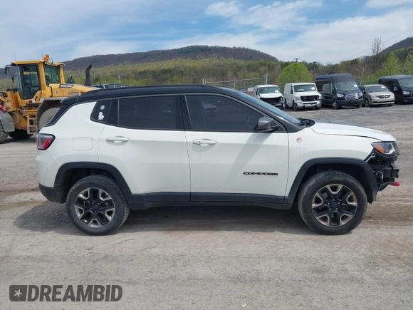 2017 Jeep Compass Trailhawk with VIN 3C4NJDDBXHT500588, listed as a IAAI auction lot 42060556 with 76,788 mi miles and . Bid and sale history available at DreamBid. Image 14.