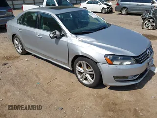 2014 Volkswagen Passat SEL Premium with VIN 1VWCN7A34EC015068, listed as a IAAI auction lot 42840821 with 147,523 mi miles and . Bid and sale history available at DreamBid. Image 1.