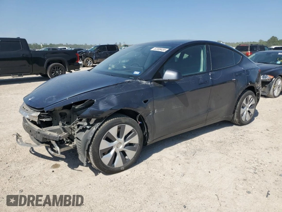 2024 Tesla Model Y Long Range with VIN 7SAYGDEE5RA282984, listed as a Copart auction lot 52388455 with 11,922 mi miles and Salvage Title. Bid and sale history available at DreamBid. Image 1.