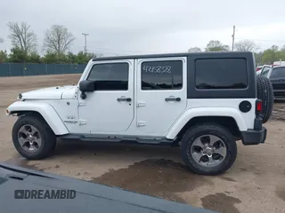 2016 Jeep Wrangler Unlimited Sahara с VIN 1C4HJWEG8GL345391, выставлен на аукционе IAAI как лот 42158328 с пробегом 61 020 миль миль и . История ставок и продаж доступна на DreamBid. Изображение 14.