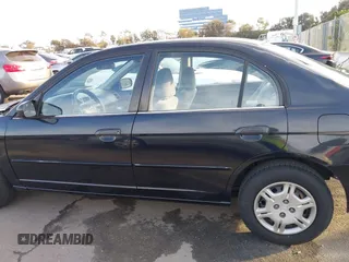 2001 Honda Civic LX with VIN 2HGES16501H619916, listed as a IAAI auction lot 41599951 with 230,395 mi miles. Bid and sale history available at carsss.com. Image 14.