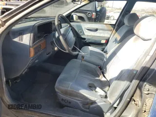 1990 Ford Taurus z VIN 1FACP5747LA124012, wystawiony jako Copart lot #85290054 z przebiegiem 118 017 mil mil oraz Czysty tytuł • Clean title. Historia ofert i sprzedaży dostępna na DreamBid. Obrazek 7.