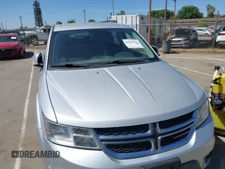 2014 Dodge Journey SXT z VIN 3C4PDDBG8ET212188, wystawiony jako IAAI lot #42101266 z przebiegiem 101 553 mil mil oraz . Historia ofert i sprzedaży dostępna na DreamBid. Obrazek 12.