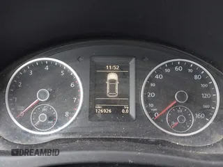 2010 Volkswagen Tiguan Wolfsburg Edition z VIN WVGBV7AX3AW511601, wystawiony jako IAAI lot #42306282 z przebiegiem 126 926 mil mil oraz . Historia ofert i sprzedaży dostępna na DreamBid. Obrazek 7.