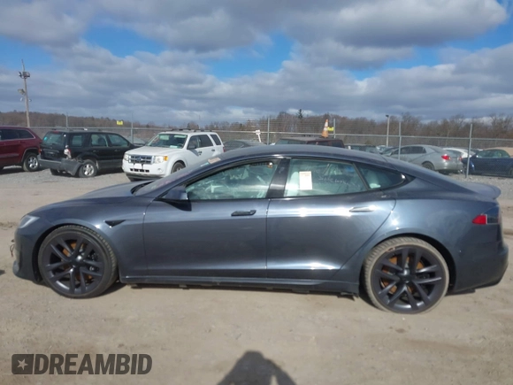 2021 Tesla Model S Plaid with VIN 5YJSA1E60MF455768, listed as a IAAI auction lot 41603504 with 27,398 mi miles. Bid and sale history available at carsss.com. Image 14.