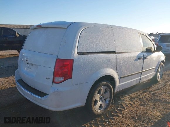 2014 Ram Cargo Van Tradesman with VIN 2C4JRGAGXER230933, listed as a IAAI auction lot 41166912 with 249,840 mi miles. Bid and sale history available at carsss.com. Image 4.