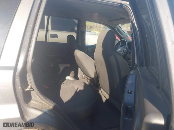 2004 Jeep Grand Cherokee Laredo with VIN 1J4GX48S44C394429, listed as a IAAI auction lot 41802203 with 144,925 mi miles. Bid and sale history available at carsss.com. Image 8.