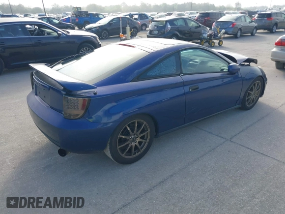 2002 Toyota Celica GT with VIN JTDDR32T220113449, listed as a IAAI auction lot 41546615 with 247,392 mi miles. Bid and sale history available at carsss.com. Image 4.