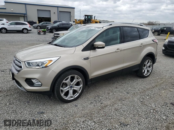 2017 Ford Escape Titanium with VIN 1FMCU0J98HUD75004, listed as a Copart auction lot 51627805 with 74,166 mi miles and Salvage Title. Bid and sale history available at carsss.com. Image 1.