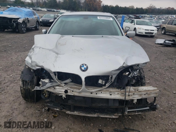 2005 BMW 3 Series 330i with VIN WBAEV53415KM42569, listed as a Copart auction lot 82333804 with 195,594 mi miles and Salvage Title. Bid and sale history available at carsss.com. Image 5.