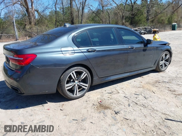 2016 BMW 7 Series 740i with VIN WBA7E2C54GG714649, listed as a IAAI auction lot 41815220 with 89,029 mi miles. Bid and sale history available at carsss.com. Image 4.
