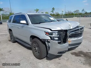 2018 Chevrolet Tahoe LT with VIN 1GNSCBKCXJR367852, listed as a IAAI auction lot 41549304 with 151,684 mi miles. Bid and sale history available at carsss.com. Image 1.