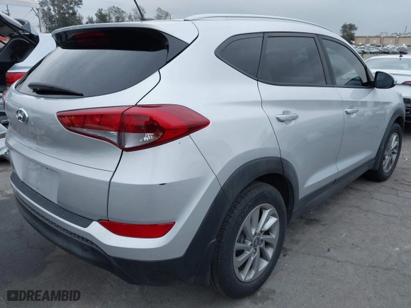 2016 Hyundai Tucson SE with VIN KM8J33A47GU242183, listed as a IAAI auction lot 41772964 with 97,527 mi miles. Bid and sale history available at carsss.com. Image 4.