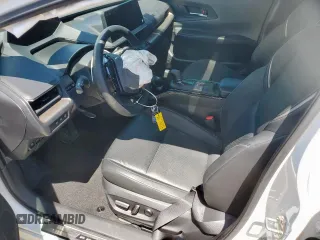 2024 Toyota Prius LE z VIN JTDACAAUXR3022411, wystawiony jako Copart lot #58263865 z przebiegiem 12 783 mil mil oraz Szkoda całkowita • Salvage title. Historia ofert i sprzedaży dostępna na DreamBid. Obrazek 7.