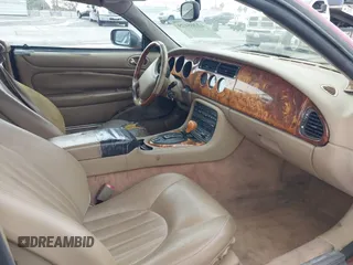 1997 Jaguar XK with VIN SAJGX2745VC017589, listed as a IAAI auction lot 42208129 with Not Provided miles and . Bid and sale history available at DreamBid. Image 5.