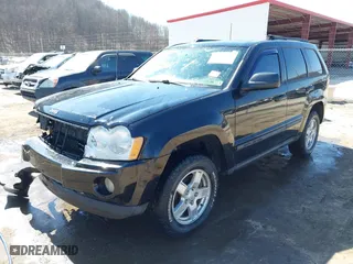 2007 Jeep Grand Cherokee Laredo with VIN 1J8GR48K67C523705, listed as a IAAI auction lot 41774281 with 215,572 mi miles. Bid and sale history available at carsss.com. Image 2.