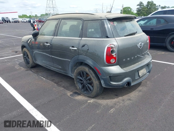 2014 MINI Countryman S with VIN WMWZC3C59EWP25041, listed as a IAAI auction lot 42085698 with 109,320 mi miles and . Bid and sale history available at DreamBid. Image 3.