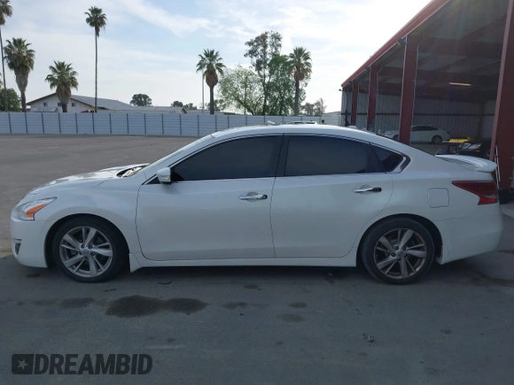 2013 Nissan Altima SL z VIN 1N4BL3AP9DC234645, wystawiony jako IAAI lot #42034822 z przebiegiem 190 148 mil mil oraz . Historia ofert i sprzedaży dostępna na DreamBid. Obrazek 14.
