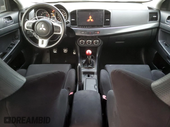 2010 Mitsubishi Lancer Evolution GSR with VIN JA32W8FV1AU027600, listed as a Copart auction lot 84328974 with 88,417 mi miles and Salvage Title. Bid and sale history available at DreamBid. Image 8.