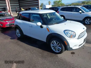 2013 MINI Countryman with VIN WMWZB3C52DWR35806, listed as a IAAI auction lot 42184010 with 93,380 mi miles and . Bid and sale history available at DreamBid. Image 1.