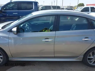 2013 Nissan Sentra SR z VIN 3N1AB7AP5DL772122, wystawiony jako IAAI lot #41945779 z przebiegiem 155 195 mil mil oraz . Historia ofert i sprzedaży dostępna na DreamBid. Obrazek 14.