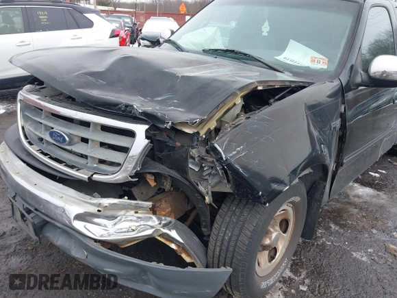 2001 Ford F-150 XL z VIN 1FTZX17201NB75918, wystawiony jako IAAI lot #41541039 z przebiegiem 225 005 mil mil oraz . Historia ofert i sprzedaży dostępna na DreamBid. Obrazek 19.