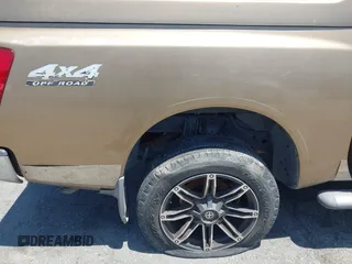 2005 Nissan Titan LE with VIN 1N6AA07B95N508001, listed as a IAAI auction lot 42656008 with 196,542 mi miles and . Bid and sale history available at DreamBid. Image 14.