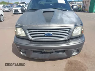 2002 Ford F-150 Harley Davidson with VIN 1FTRW07312KC88379, listed as a IAAI auction lot 41657219 with 1 mi miles. Bid and sale history available at carsss.com. Image 6.