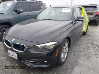 2017 BMW 3 Series 330e iPerformance with VIN WBA8E1C58HK480271, listed as a IAAI auction lot 42039429 with 93,242 mi miles. Bid and sale history available at carsss.com. Image 2.