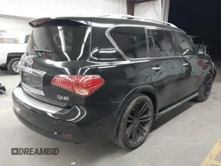 2014 Infiniti QX80 with VIN JN8AZ2NF2E9555963, listed as a IAAI auction lot 41894699 with 143,255 mi miles. Bid and sale history available at carsss.com. Image 4.