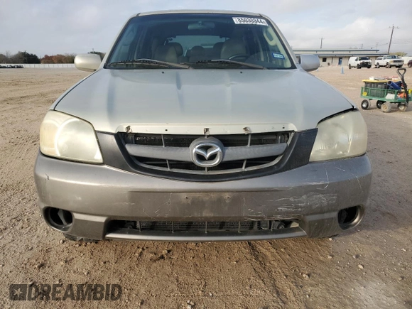 2005 Mazda Tribute i with VIN 4F2YZ02Z95KM44817, listed as a Copart auction lot 85033344 with 258,976 mi miles and Salvage Title. Bid and sale history available at carsss.com. Image 5.