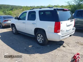2009 GMC Yukon SLT w/4SA with VIN 1GKFK33049R241378, listed as a IAAI auction lot 42124385 with 292,192 mi miles. Bid and sale history available at carsss.com. Image 3.