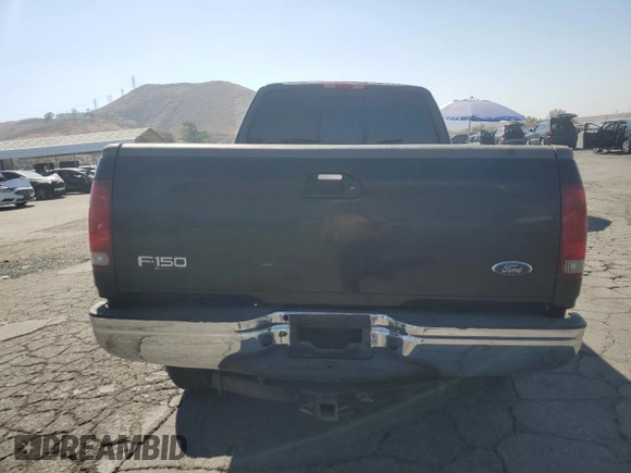 2000 Ford F-150 XL with VIN 1FTRX17W7YKB44552, listed as a Copart auction lot 72790504 with 0 mi miles and Salvage Title. Bid and sale history available at carsss.com. Image 6.
