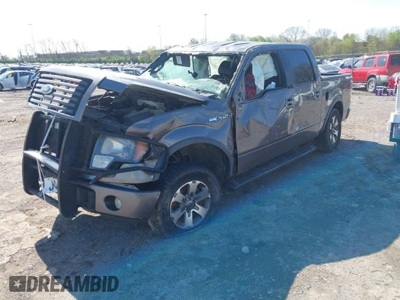 2012 Ford F-150 XL with VIN 1FTFW1EF6CKD30486, listed as a IAAI auction lot 41972362 with 328,321 mi miles. Bid and sale history available at carsss.com. Image 2.
