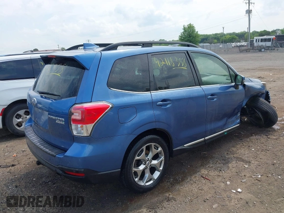 2017 Subaru Forester Touring with VIN JF2SJAWC7HH455648, listed as a IAAI auction lot 42118358 with 58,123 mi miles and . Bid and sale history available at DreamBid. Image 4.