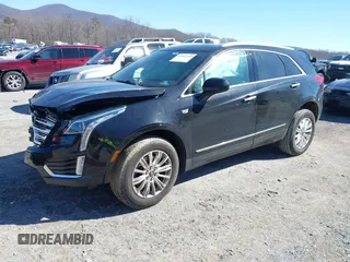 2018 Cadillac XT5 FWD with VIN 1GYKNARS5JZ235585, listed as a IAAI auction lot 41607440 with 77,220 mi miles and . Bid and sale history available at DreamBid. Image 21.