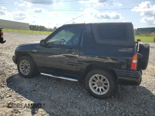 2000 Suzuki Vitara JLS z VIN 2S3TC52CXY6106646, wystawiony jako Copart lot #72450524 z przebiegiem 167 812 mil mil oraz Szkody całkowita. Historia ofert i sprzedaży dostępna na DreamBid. Obrazek 2.