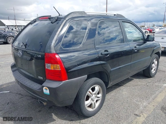 2006 Kia Sportage LX with VIN KNDJF723367279463, listed as a IAAI auction lot 41787584 with 171,271 mi miles. Bid and sale history available at carsss.com. Image 4.