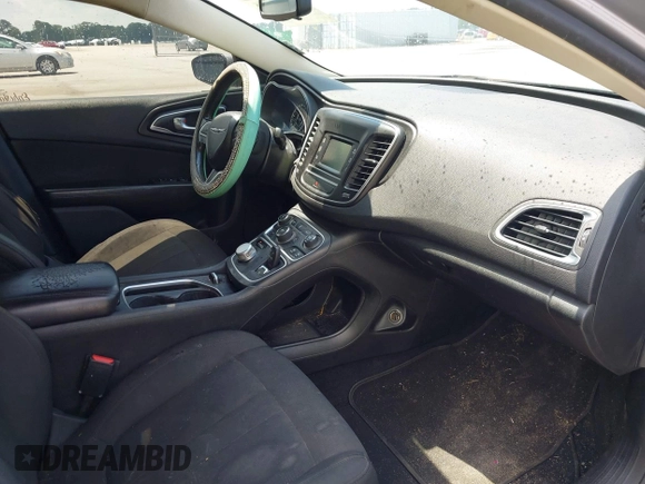2015 Chrysler 200 Limited with VIN 1C3CCCAB1FN687236, listed as a IAAI auction lot 42621416 with 138,525 mi miles and . Bid and sale history available at DreamBid. Image 5.