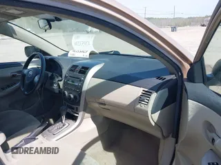 2011 Toyota Corolla L with VIN 2T1BU4EE1BC547635, listed as a IAAI auction lot 42053236 with 121,485 mi miles. Bid and sale history available at carsss.com. Image 5.